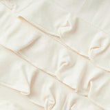 Salt Luxe Solid Ruffle Footed Romper
