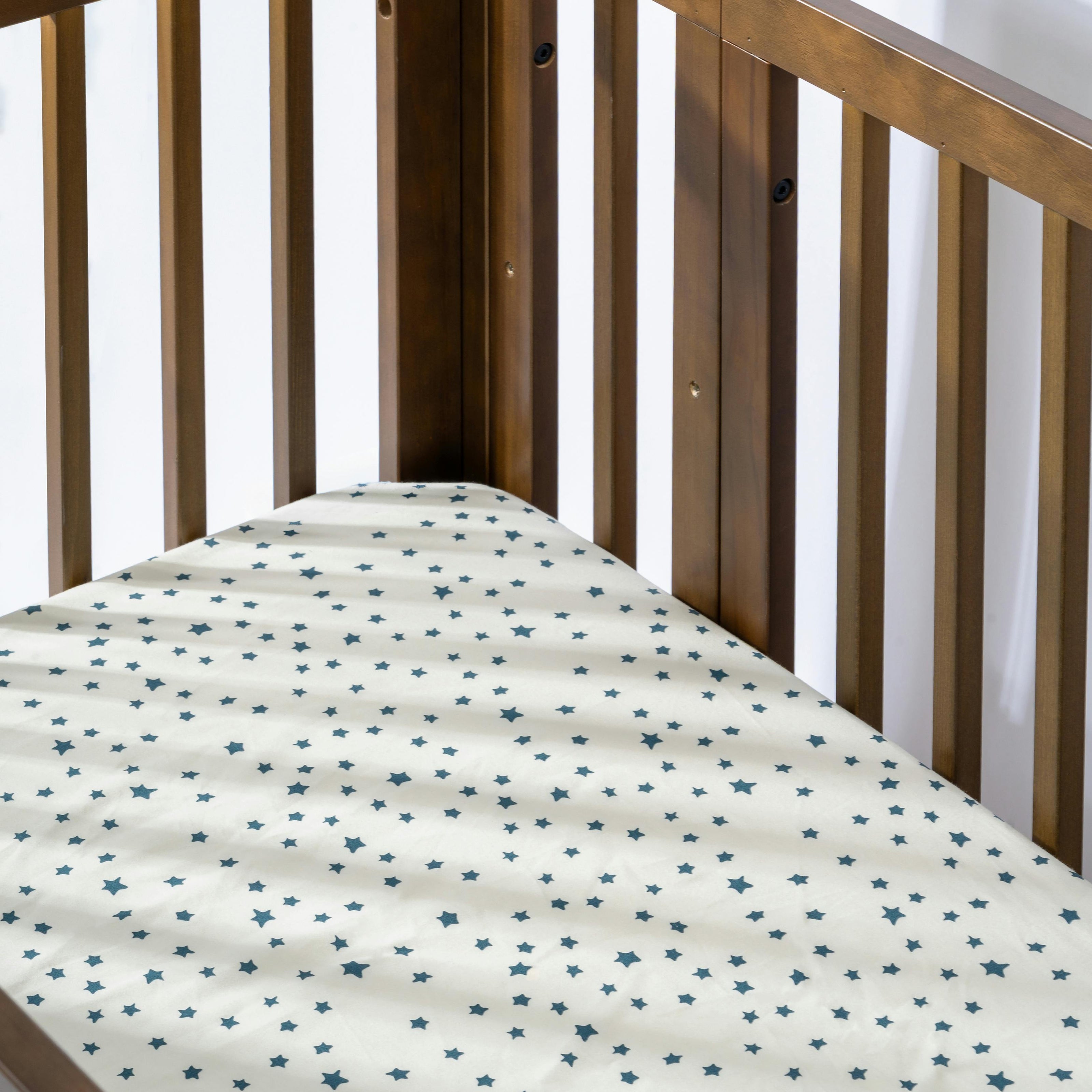 Crib Sheet in GOTS Certified Organic Brushed Cotton in Ivory with Navy Stars