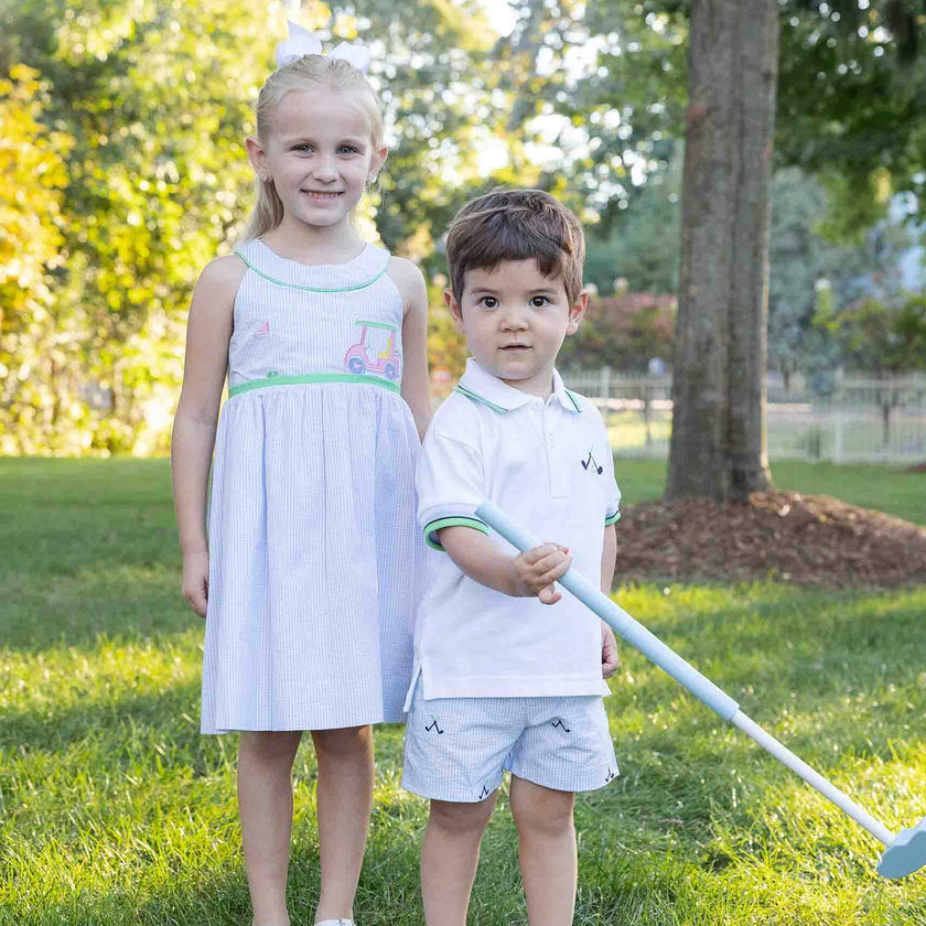 Knit Polo With Golf Clubs