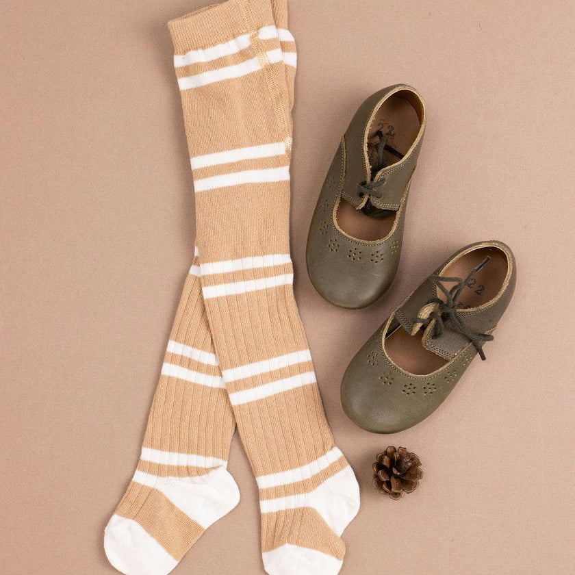 Sylvie Tight, Tan