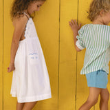 girls shell white cross back pinafore dress
