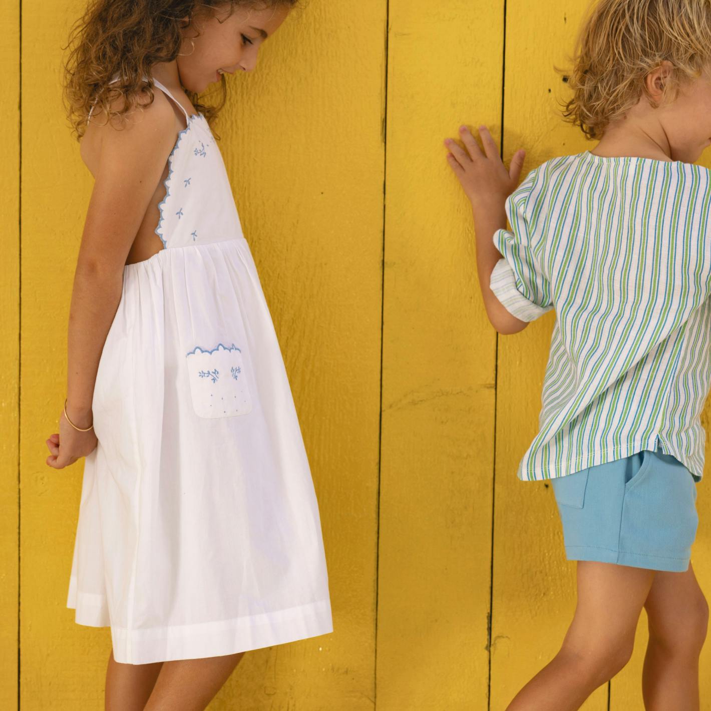 girls shell white cross back pinafore dress
