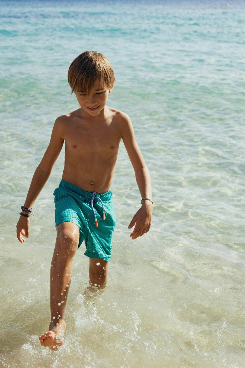Boys' swim shorts, green stripes | FIJI
