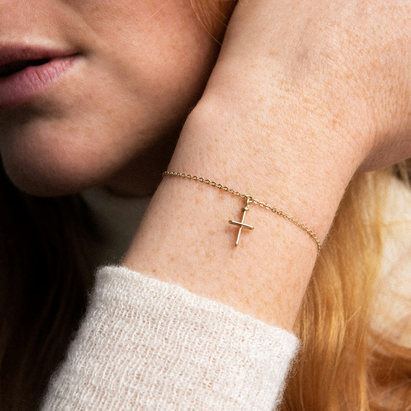 Symbolic Cross Charm Bracelet , Rolled Yellow Gold