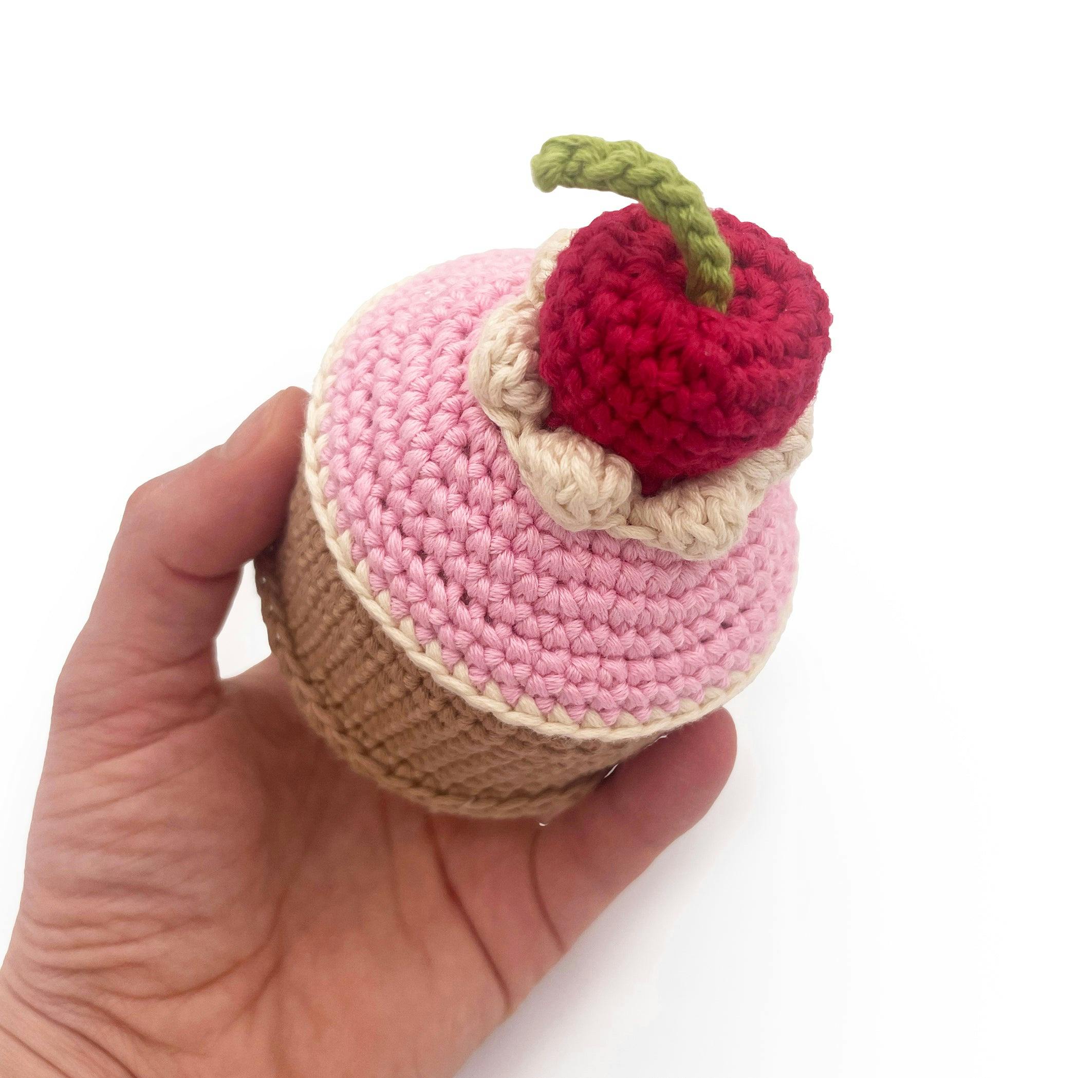 Cherry cake 100% organic cotton rattle