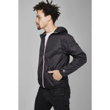 Navy women's quarter zip packable rain jacket and windbreaker
