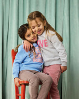 Here Comes Trouble Sweatshirt in Blue/Pink