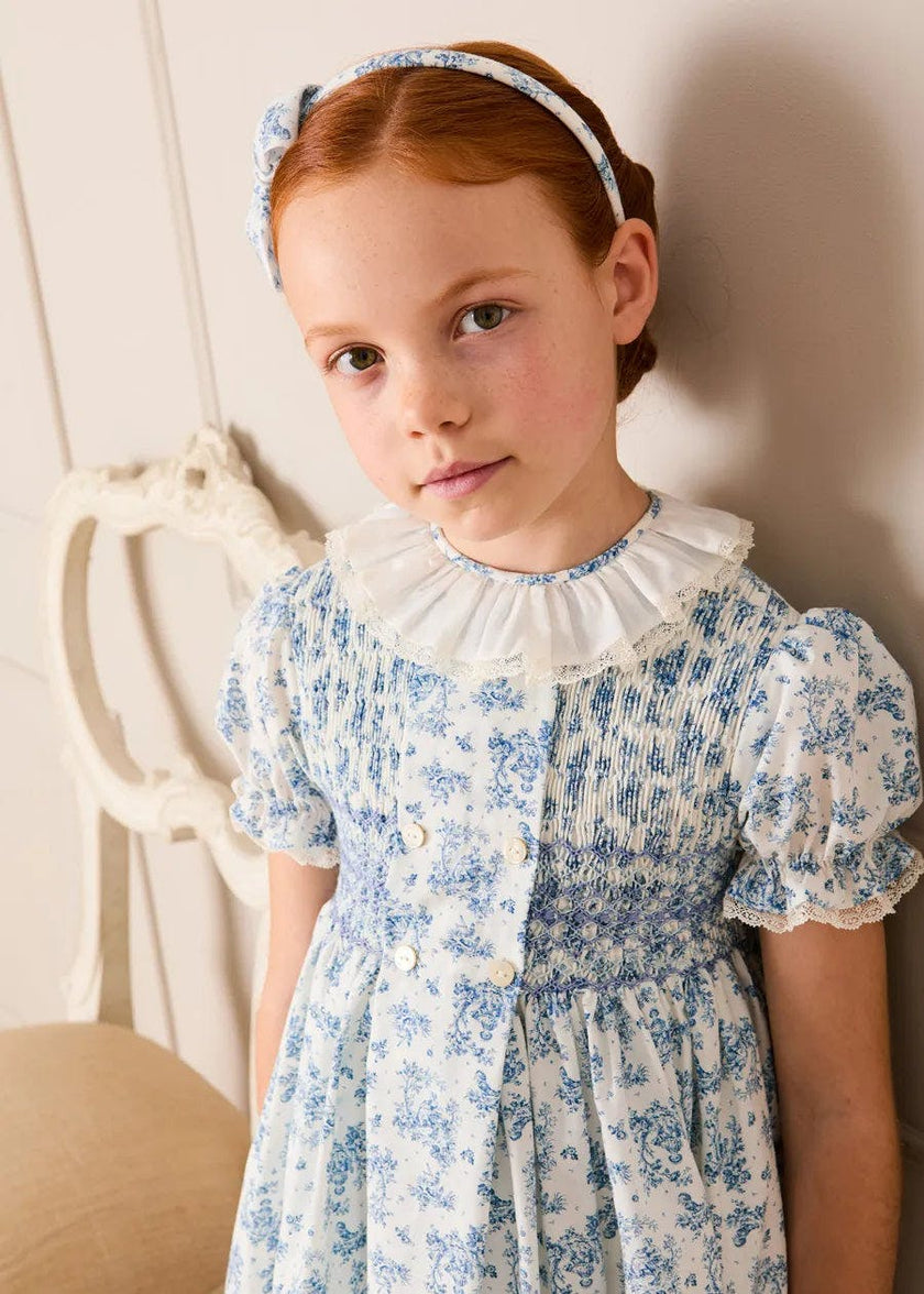 Audrey Toile Hand Smocked Ruffle Collar Short Sleeve Dress in Blue (12mths- 10yrs)