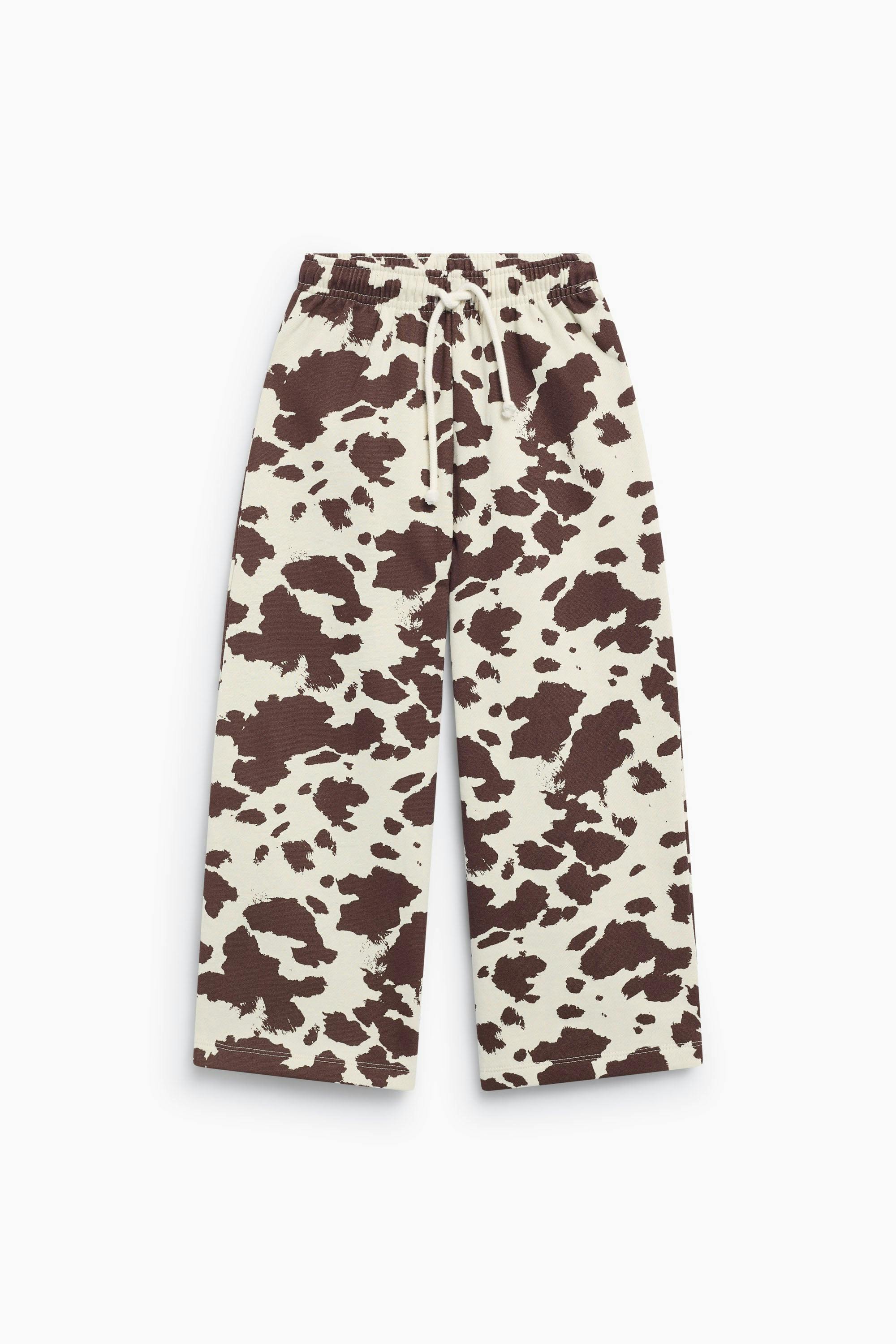 TNS Logo Jogging Cow Print