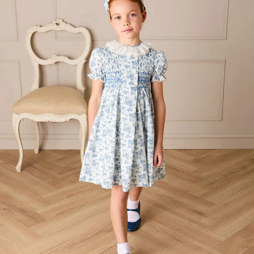 Audrey Toile Hand Smocked Ruffle Collar Short Sleeve Dress in Blue (12mths- 10yrs)