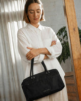 Riley Compact East-West Changing Bag Black Woven