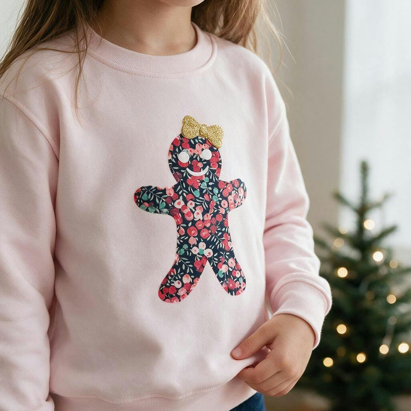 Liberty of London children's gingerbread design pale pink jumper