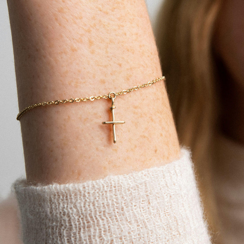 Symbolic Cross Charm Bracelet , Rolled Yellow Gold